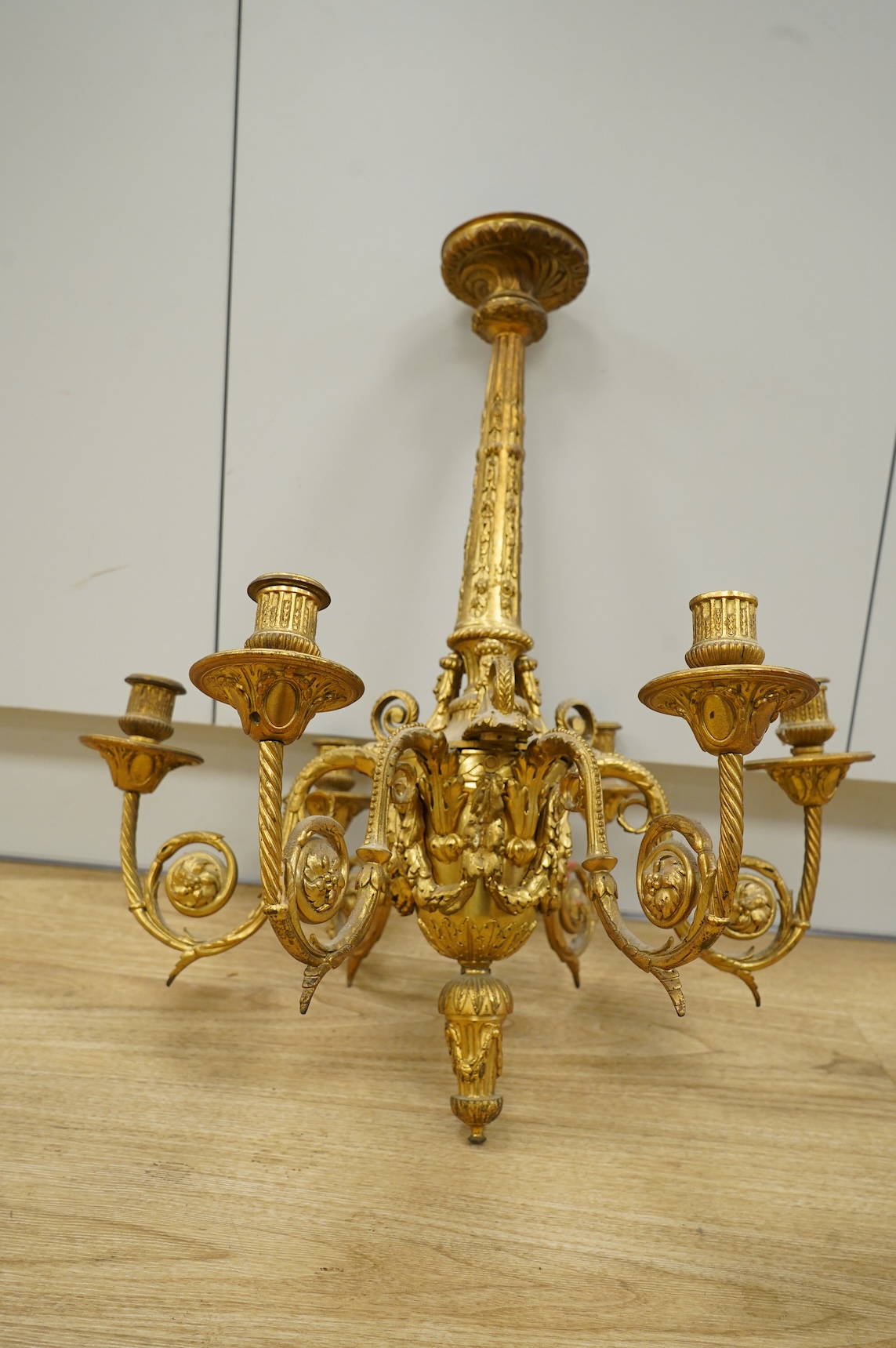 A Louis XVI style six branch ormolu electrolier, 62cm high